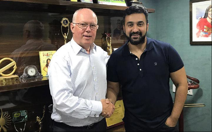 Raj Kundra handshake